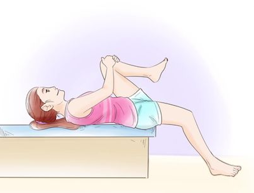 Estiramiento iliopsoas desde camilla